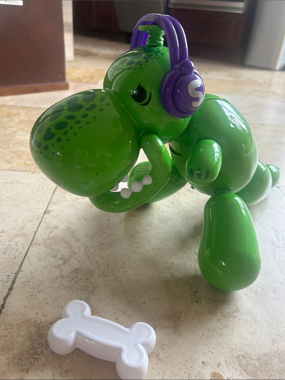 Kids Green Dinosaur squeaky Interactive Toy with Purple Headphones and bone